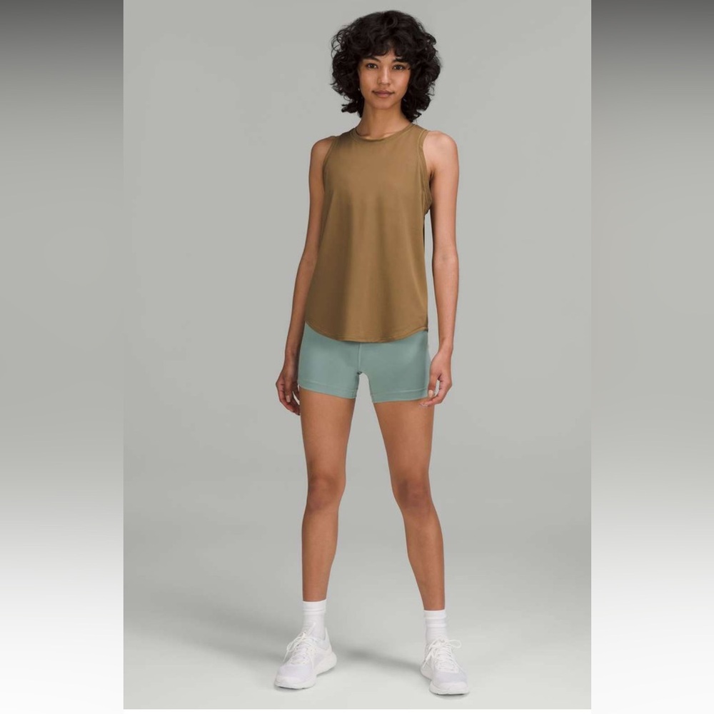 39. Lululemon High-Neck Running and Training Tank Top Artifact 8